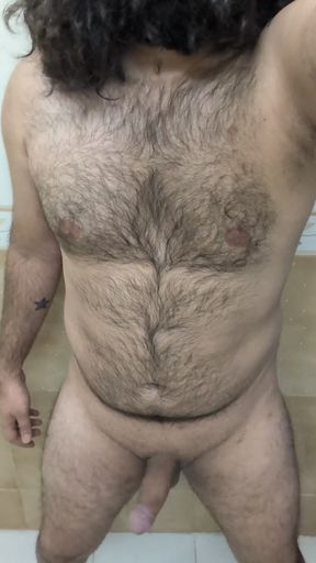 Hairy-chested Indian man shows off his big cock in a solo video