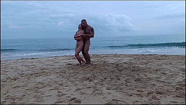 Romantic Dancing Of A Naked Couple On A Public Beach