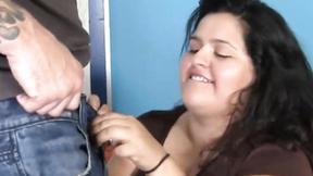 ”BBW brunette shows buxxom body & sucks shaft”