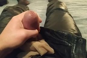 Leather pants unbuttoning and cum.