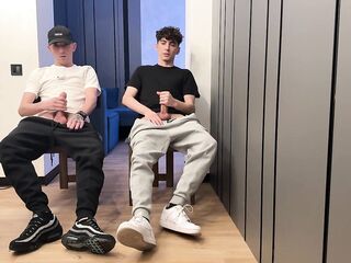 two lads jerking off uncut dick and cum