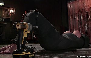 Busty slave is mummified and chained