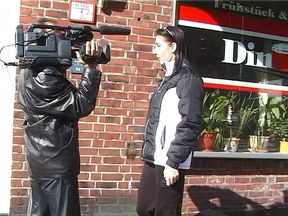 Young brunette interviewed on the street