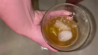 Girl pissing out a dirty martini