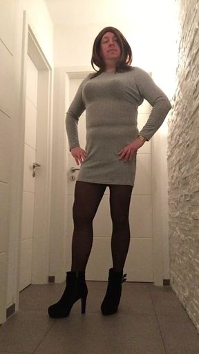 Nicki-Crossdress in a beautiful grey Mini-Dress, black Pantyhose and Plateau-Boots