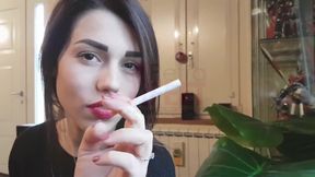 Smoking in close up with a beautiful girl