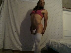 Sissy bodybuilder dude shows off his muscular ass in thongs