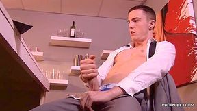 Horny gay dude wanks his nice big dick at the office
