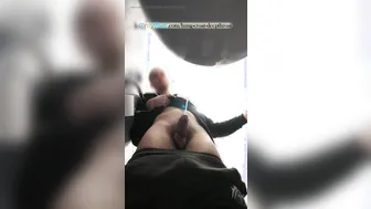 Young uncut guy pisses hands-free in bathroom