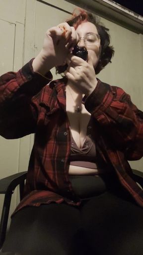 Woman taking selfie with cell phone