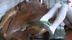 Hot blonde shows off her adorable feet wearing stockings