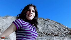 Pretty latina with booty is stripping at the beach