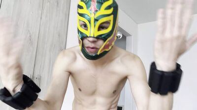 Latin gay guy models his mask and makes a spectacular show