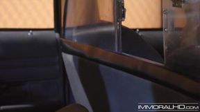 Blonde babe with big tits teases her pussy in the car