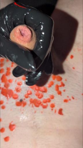 Playing with my slaves urethra after some hot wax