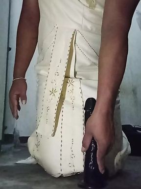 Crossdresser in Thai dress with her beloved dildo