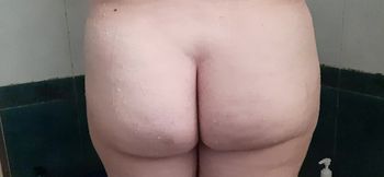 My stepmother was taking a shower and asked me to rub her back.