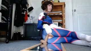 Teen femboy in D.Va cosplay spreads and dildos his butt