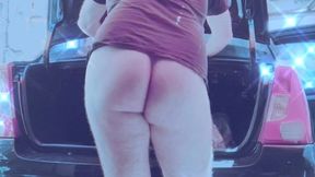 naked man cleaning car