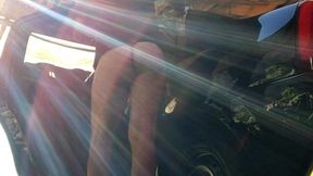 naked man cleaning car