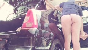 naked man cleaning car
