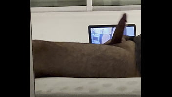 Giving pleasure to my uncut cock on my bed