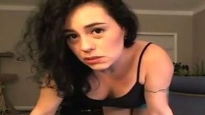Small boobed brunette is showing off her round booty
