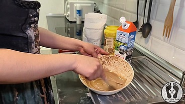 ANA SPEARS IN DIRNDL COOKING A SPECIAL CAKE
