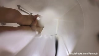 Nicole brings her camera into the shower