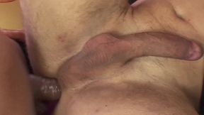 Buffed guy serving two big shemale dicks