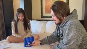 Playing a strip Connect 4 on the bed and losing all clothes in the process