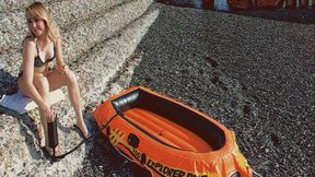 Alla inflates an inflatable boat on the beach with a hand pump!!!