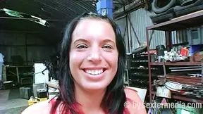 Hot brunette milf wiggles in sexy red dress and sucks her big tits