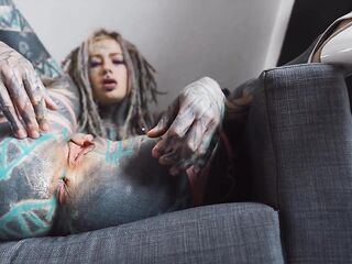 Beautiful tattooed cutie screws her butt with a large vibrator