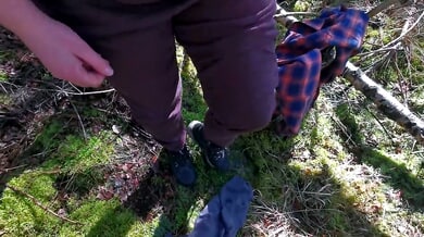 Plump woman in plaid shirt dominated and exposed on mossy forest floor
