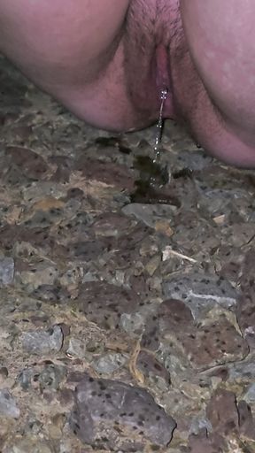 Teen pisses outdoors