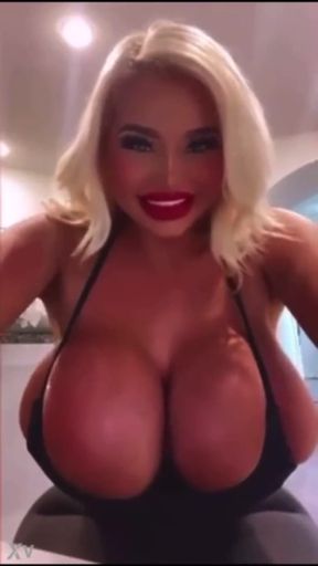 Busty bimbo gets tit worshipped