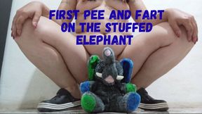 First pee and fart on the stuffed elephant