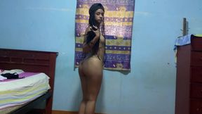 Latina strips and shakes her ass