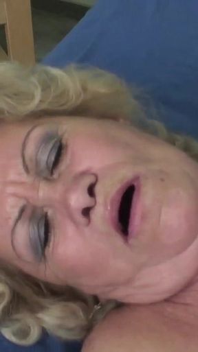 This hot and sexy busty and very horny granny lets her tight and very hairy pussy get wildly fucked