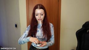 Adelina is smoking Virginia Slims 120s lighting with a match | 4k resolution
