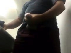 MILKING HIS BIG UNCUT BRAZILIAN DONKEY DICK AT WORK
