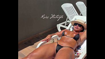 Hot wife Kriss shows off her naughty bikini at the hotel pool