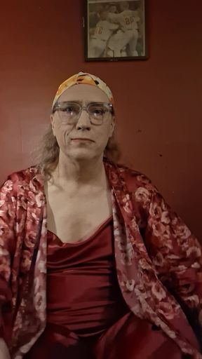 Ugly old tranny goes wild on a pair of dildos