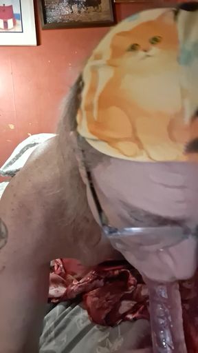 Ugly old tranny goes wild on a pair of dildos