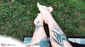 Sexy feet outdoor on the grass - foot fetish