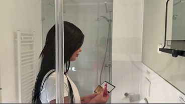 Hot sexy slim brunette babe in a pink mini skirt prepares for her night out