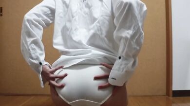 A girl wearing a boyfriend shirt has a continuous orgasm with electric massager masturbation.