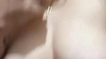 Lovely pinay Milf with huge tits