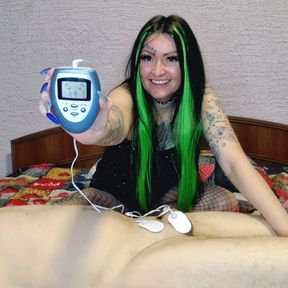 Electrostimulation of the penis and testicles. Dominatrix Nika plays with electric discharges on the genitals of the slave